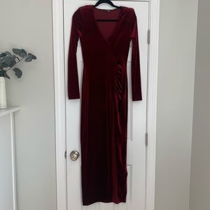 Deep red velvet maxi with slit.